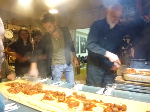 pouring the sauce on